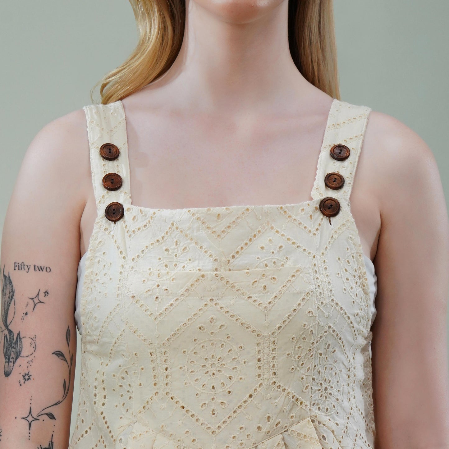 Vanilla Cotton Sleeveless Schiffli Jumpsuit with Scalloped Hem & Wooden Button Straps