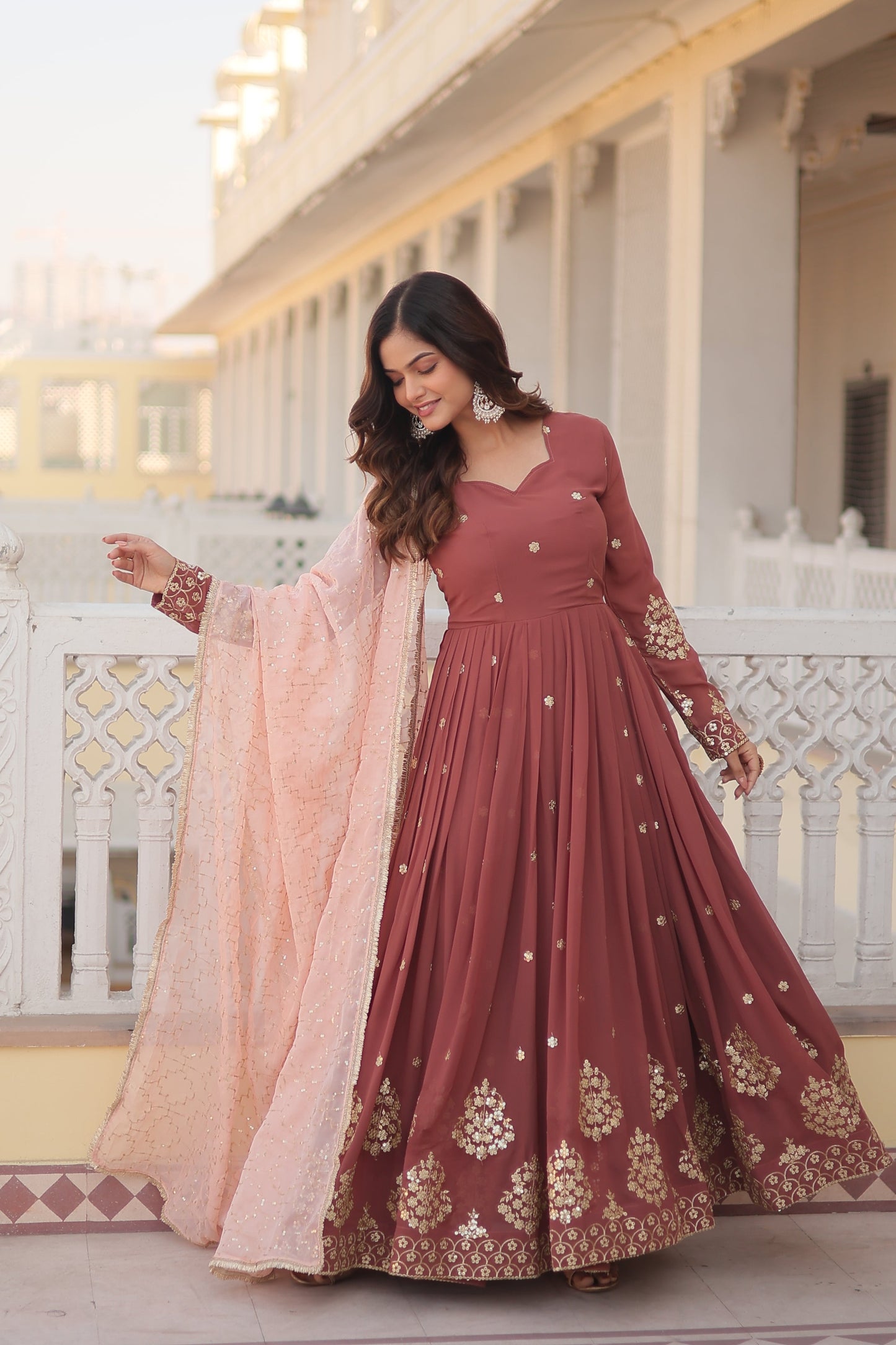 Designer Gown is luxury clothing Considered to be high quality Made by Zari Thread & Sequins Embroidery. This is Made for Desirable Women's who deserve it