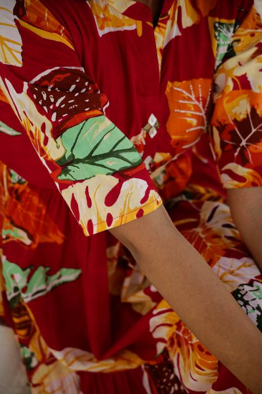 Vibrant Red Floral Maxi Dress with Tropical Patterns