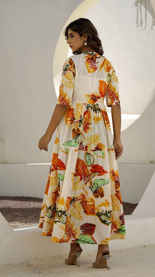 Cream Floral Maxi Dress with Tropical Leaf Patterns