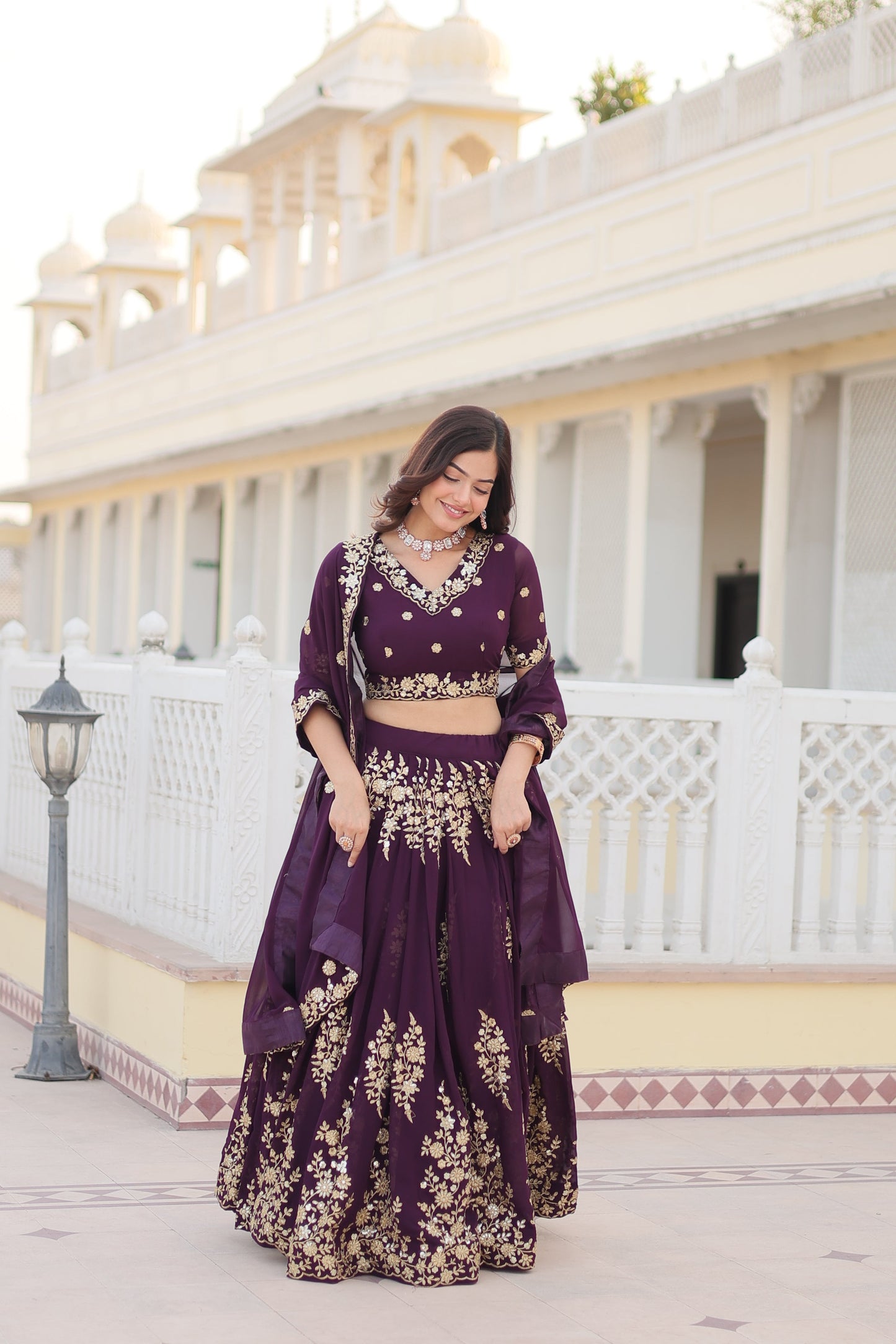 Trending Wine Embroidered Fully Flaired Georgette Lehenga Made with Rich Sequins And Thread Embroidered Work With Stunning Blouse And Dupatta.