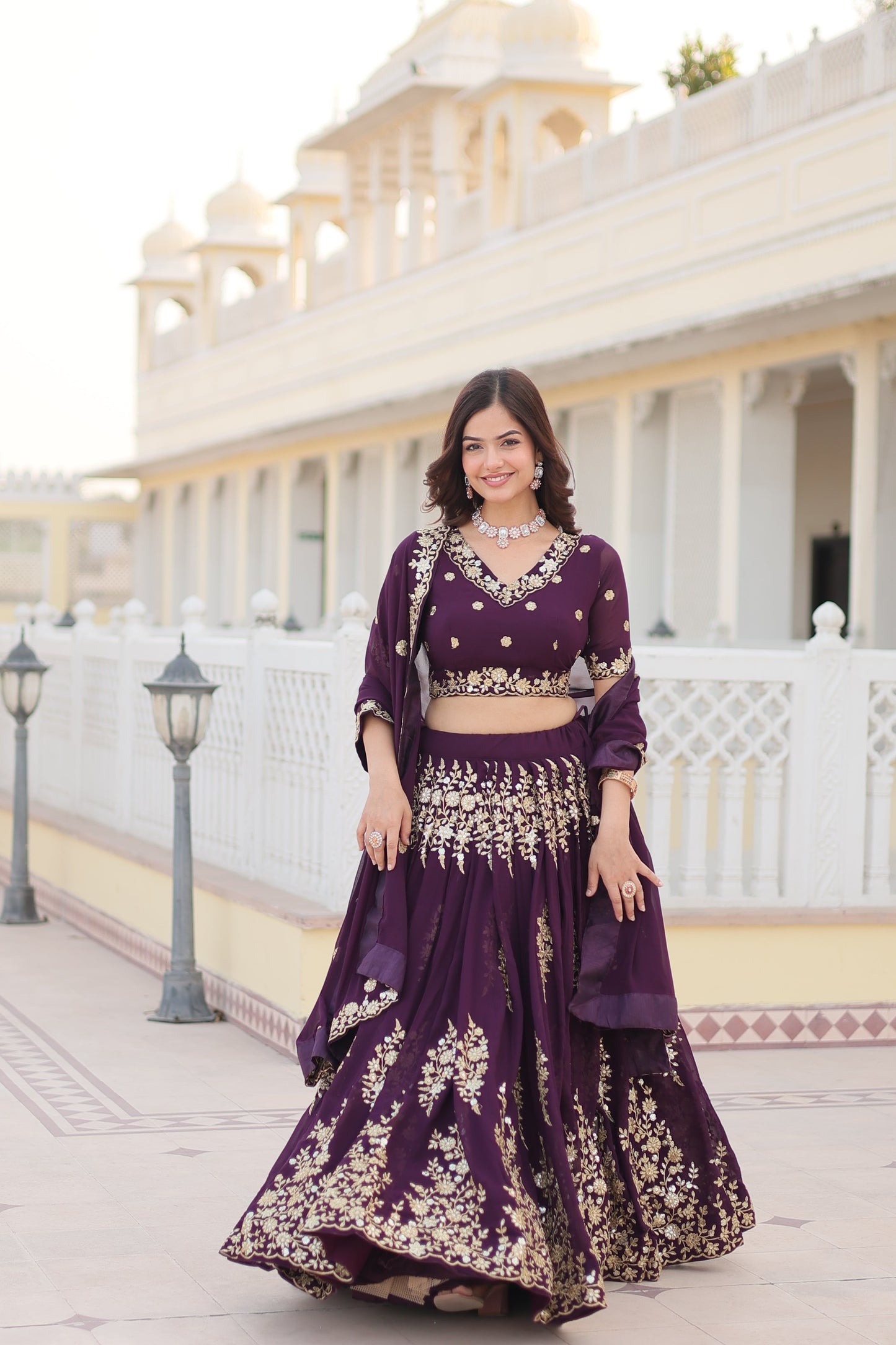 Trending Wine Embroidered Fully Flaired Georgette Lehenga Made with Rich Sequins And Thread Embroidered Work With Stunning Blouse And Dupatta.