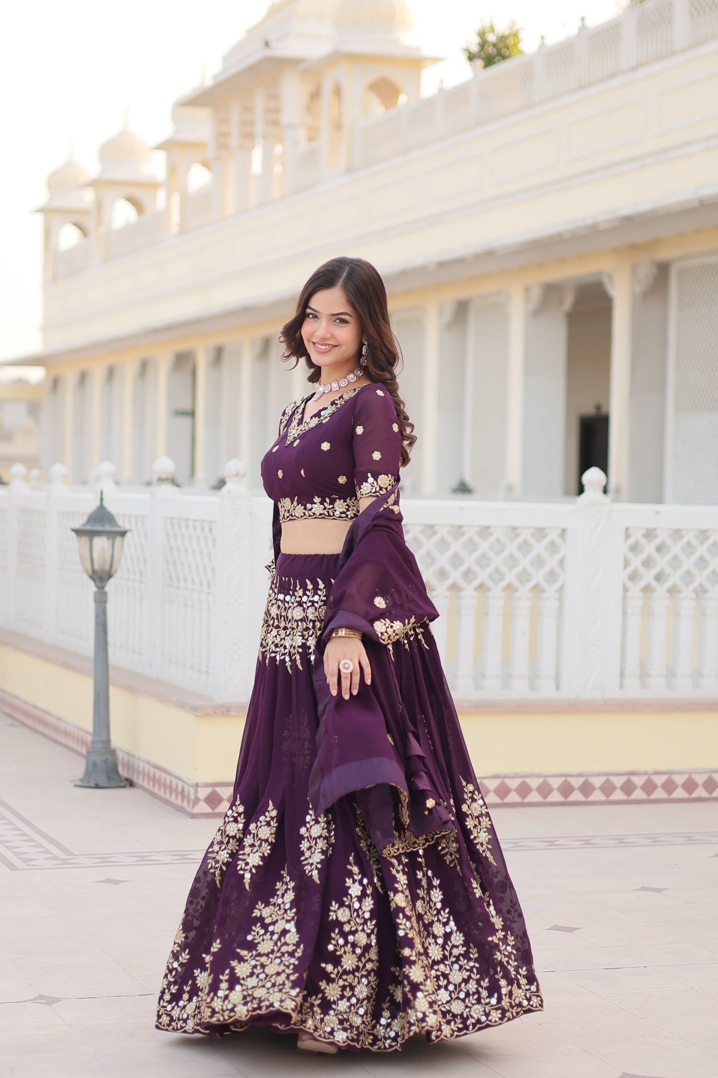 Trending Wine Embroidered Fully Flaired Georgette Lehenga Made with Rich Sequins And Thread Embroidered Work With Stunning Blouse And Dupatta.
