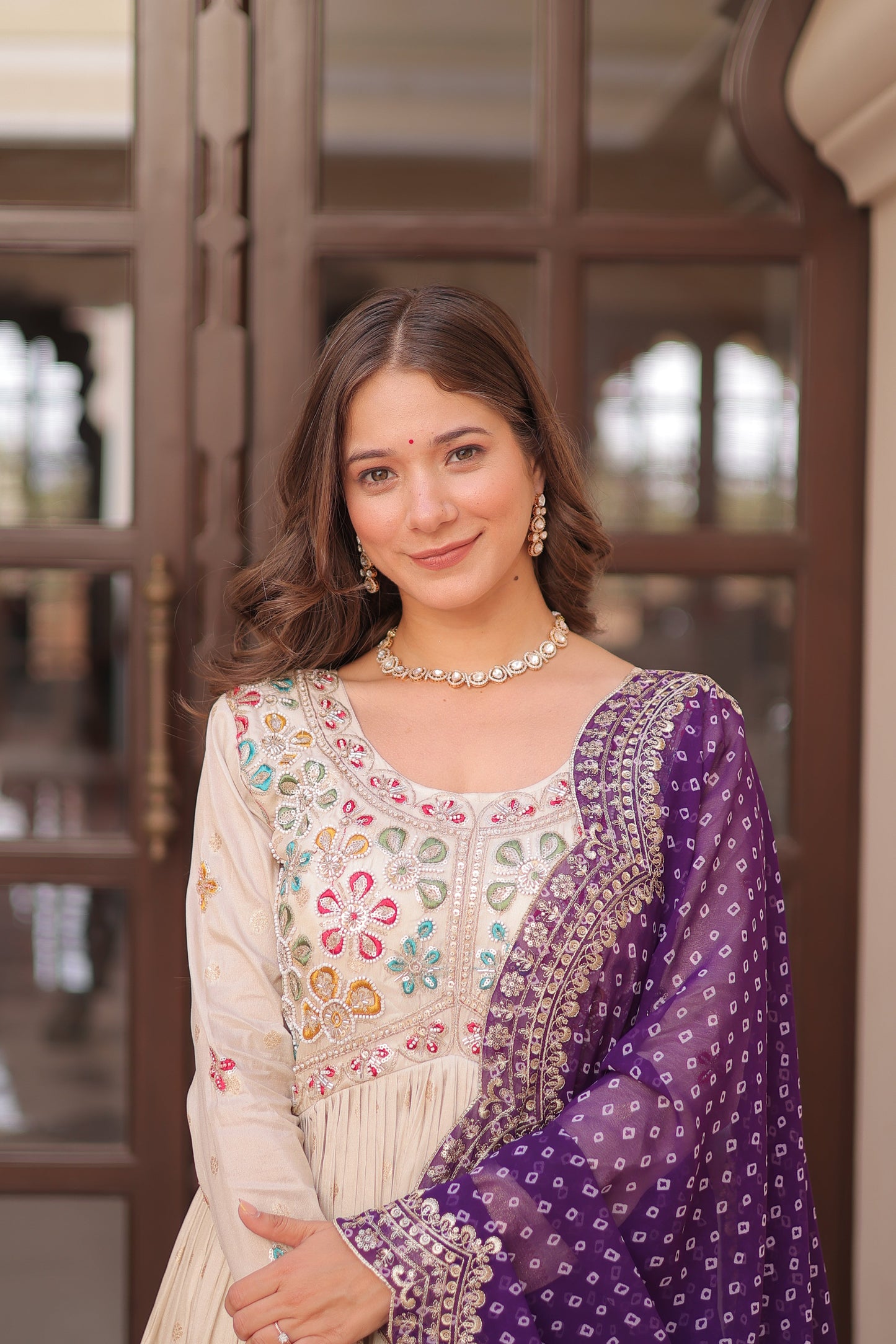 *Experience the allure of Trending Cosmos Jequard Gown With Bandhani Printed Embroidered Cut work Dupatta. Discover the perfect fusion of elegance and grace. Shop now for a timeless appearance.*